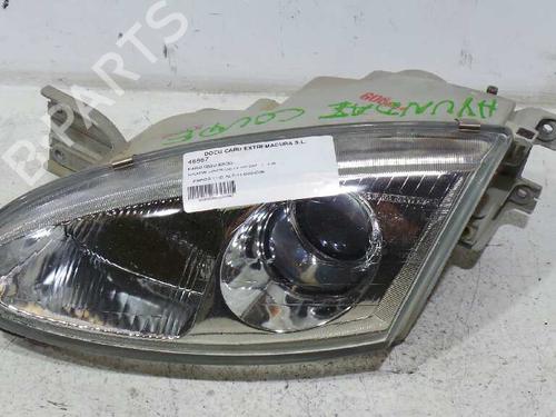Used Left headlight HYUNDAI COUPE I (RD) 1.6 i 16V (114 hp) 1210547