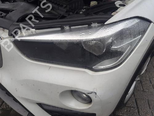 Phare gauche BMW X1 (F48) sDrive 18 i (136 hp) 33018458