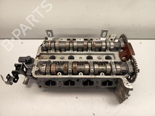 Used Cylinder head Cylinder head OPEL TIGRA TwinTop (X04) 1.4 (R97) (90 hp) 33438312 33438312