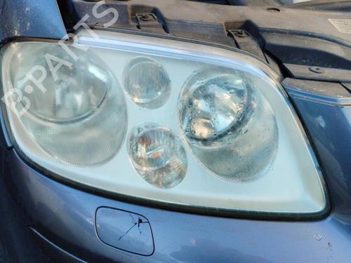 Used Right headlight VW TOURAN (1T1, 1T2) 1.9 TDI (105 hp) 25683805