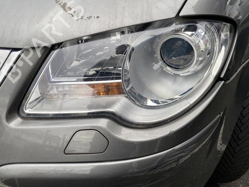 Used Left headlight VW TOURAN (1T1, 1T2) 1.9 TDI (105 hp) 30732632