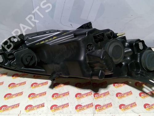 Used Left headlight Left headlight PEUGEOT 1007 (KM_) 1.4 HDi (68 hp) 25698871 25698871