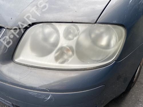 Used Left headlight VW TOURAN (1T1, 1T2) 2.0 TDI (136 hp) 26240814