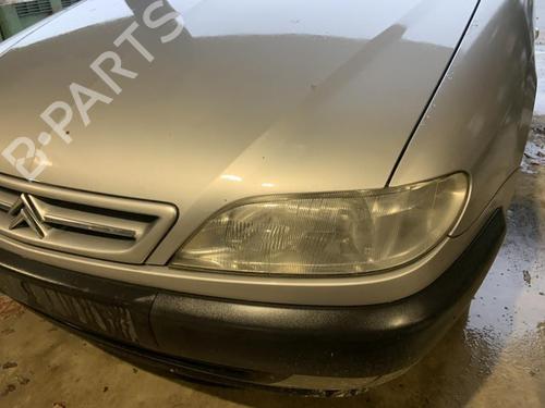 Used Left headlight CITROËN XSARA (N1) 1.9 D (68 hp) 26428040
