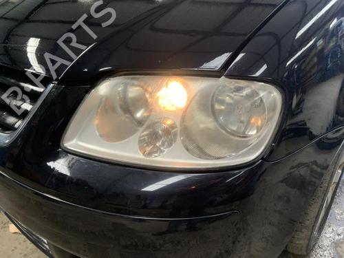 Used Left headlight VW TOURAN (1T1, 1T2) 2.0 TDI (136 hp) 26417232