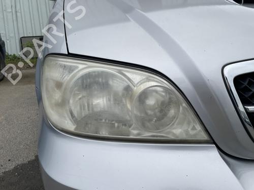 Used Right headlight KIA CARNIVAL I (UP) 2.9 TDi (126 hp) 26951417