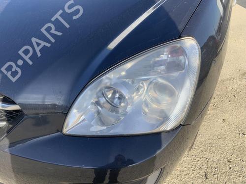 Used Left headlight KIA CARENS III MPV (UN) 2.0 CRDi 140 (140 hp) 26422547
