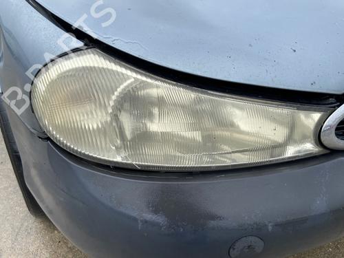 Used Right headlight FORD MONDEO II Turnier (BNP) 2.0 i (131 hp) 32425682