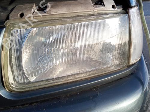 Used Left headlight VW POLO III (6N1) 64 1.9 D (64 hp) 27100068