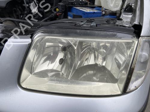 Used Left headlight VW POLO (6N2) 1.4 (60 hp) 30900935
