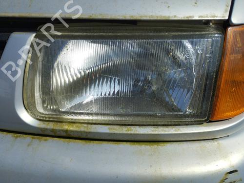 Used Left headlight VW POLO III (6N1) 64 1.9 D (64 hp) 27049208
