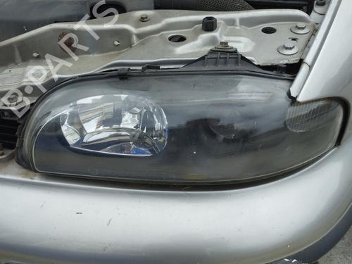 Faro izquierdo FIAT MAREA (185_) 1.9 JTD 110 (185AXT1A) (110 hp) 27659394