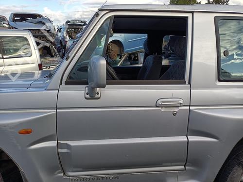 Used Left front door MITSUBISHI GALLOPER (JK-01) 3.0 V6 (141 hp) 31589341