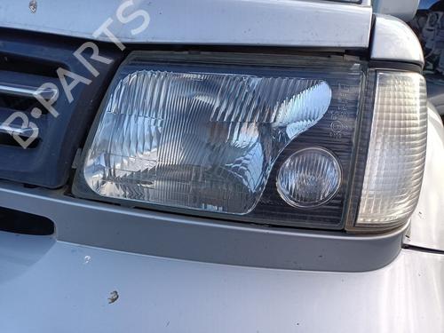 Used Left headlight MITSUBISHI GALLOPER (JK-01) 3.0 V6 (141 hp) 31589327