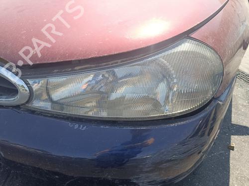 Used Left headlight FORD MONDEO II (BAP) 1.8 TD (90 hp) 26543980
