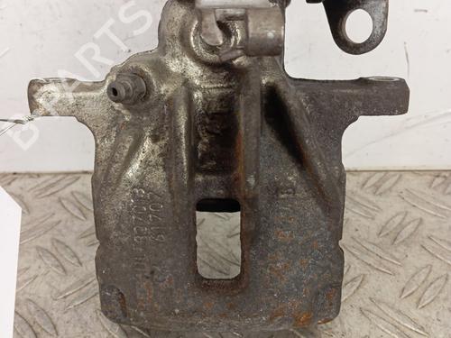 Używane Zacisk hamulca tylnego lewego RENAULT TRAFIC II Van (FL) 1.9 dCi 80 (FL0B) (82 hp) 30615280