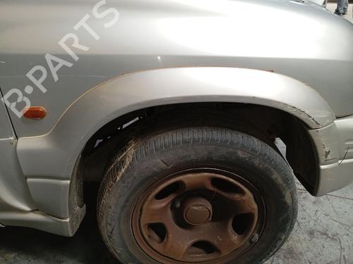 Used Front right wheel arch trim Front right wheel arch trim SUZUKI GRAND VITARA I (FT, HT) 2.0 TD 4x4 (SQ420D) (87 hp) 34439375 34439375