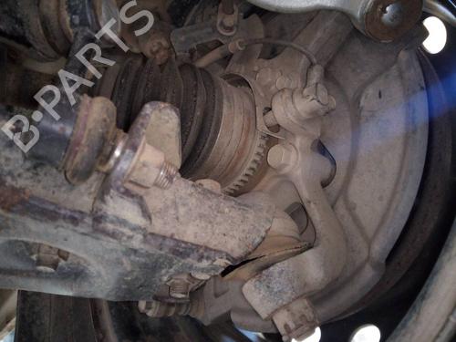 Used Left front steering knuckle MITSUBISHI L200 / TRITON (KA_T, KB_T) 2.5 DI-D 4WD (KB4T) (136 hp) 11384865