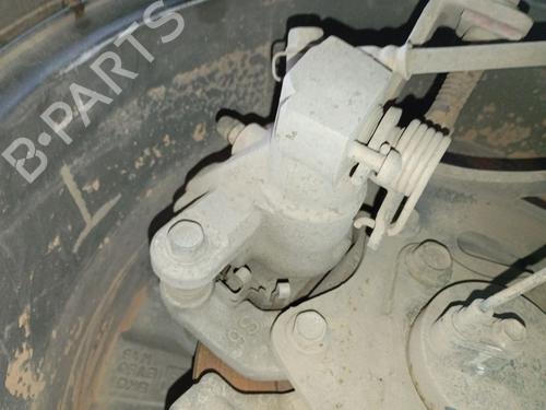 Używane Zacisk hamulca tylnego lewego Zacisk hamulca tylnego lewego SUZUKI VITARA (LY) 1.0 (APK 310) (111 hp) 36453366 36453366