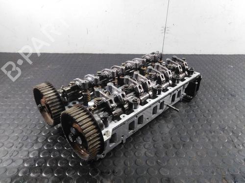 Used Cylinder head KIA CARNIVAL I (UP) 2.9 TDi (126 hp) 10974894