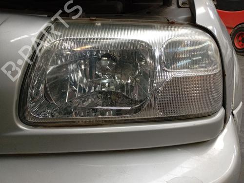Venstre forlygte Venstre forlygte SUZUKI GRAND VITARA I (FT, HT) 2.0 TD 4x4 (SQ420D) (87 hp) 34439402 34439402
