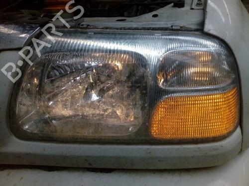 Scheinwerfer links für SUZUKI GRAND VITARA I (FT, HT) 2.0 HDI 110 4x4 (SQ420D, TD82V) (109 hp) 6021268