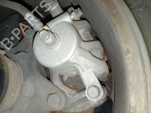 Używane Zacisk hamulca przedniego lewego SSANGYONG TIVOLI 1.2 (128 hp) 30599427