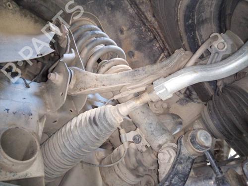 Used Left front shock absorber MITSUBISHI L200 / TRITON (KA_T, KB_T) 2.5 DI-D 4WD (KB4T) (136 hp) 11384282