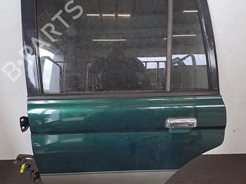 Used Left rear door MITSUBISHI PAJERO SPORT I (K7_, K9_) 2.5 TD (K94W) (99 hp) 28389507