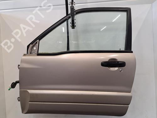Used Left front door SUZUKI GRAND VITARA I (FT, HT) 2.0 HDI 110 16V 4x4 (SQ420D, TD83V, JA420WD) (109 hp) 28391445