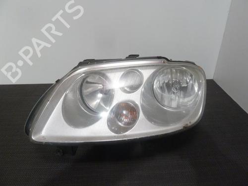 Used Left headlight VW TOURAN (1T1, 1T2) 2.0 TDI (136 hp) 28394493