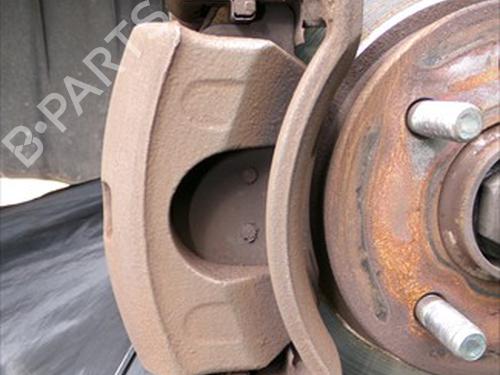 Used Left front brake caliper KIA RIO III (UB) 1.25 CVVT (86 hp) 31847824