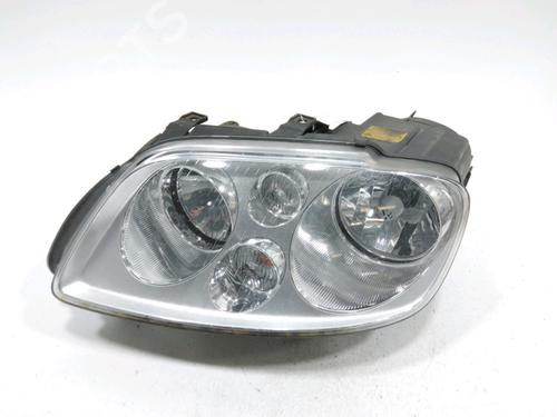 Used Left headlight VW TOURAN (1T1, 1T2) 1.9 TDI (105 hp) 31005205