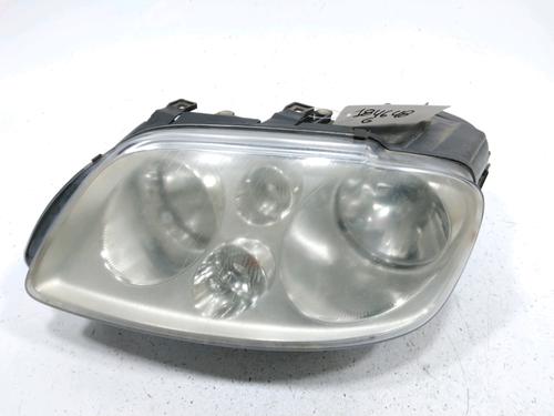 Used Left headlight VW TOURAN (1T1, 1T2) 1.9 TDI (100 hp) 31005131