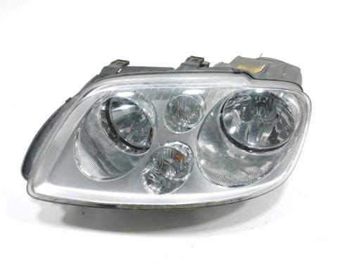 Used Left headlight VW TOURAN (1T1, 1T2) 1.9 TDI (105 hp) 31005111