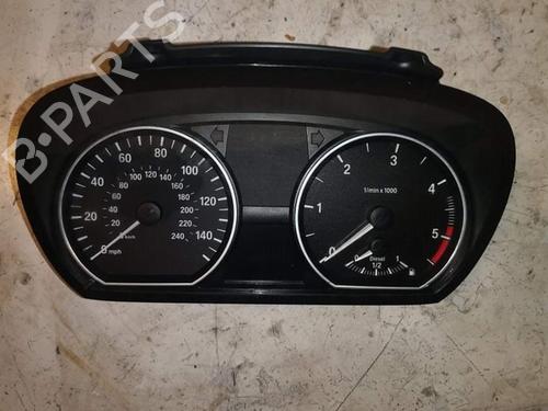 Used Instrument cluster BMW 1 (E81) 118 d (143 hp) 28940176