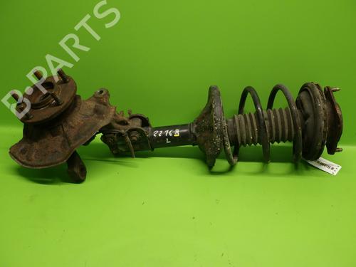 Used Left front shock absorber MAZDA 626 IV Hatchback (GE) 2.0 i (GE10S1) (115 hp) 30892401