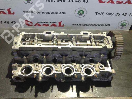 Used Cylinder head FORD FIESTA V (JH_, JD_) 1.4 TDCi (68 hp) 10980008