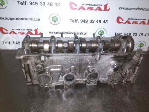 Used Cylinder head BMW 3 (E36) 318 tds (90 hp) 10979999