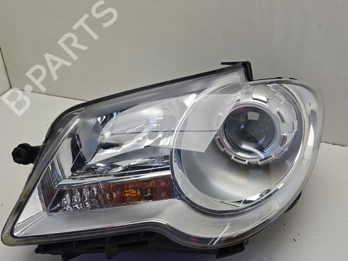 Used Left headlight VW TOURAN (1T1, 1T2) 1.9 TDI (105 hp) 30964491
