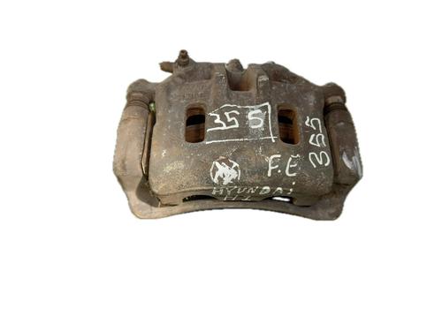 Used Left front brake caliper HYUNDAI H-1 Van (A1) 2.5 CRDi (110 hp) 29776820