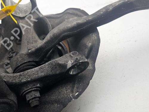Used Left front steering knuckle BMW 1 (F20) 116 d (116 hp) 31332495