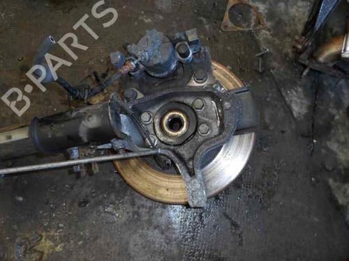 Used Left front steering knuckle RENAULT LAGUNA III (BT0/1) 2.0 dCi (BT01, BT08, BT09, BT0E, BT0K, BT12, BT1C, BT1D,... (150 hp) 2682846