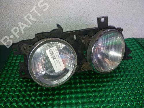 Used Left headlight BMW 5 (E34) 520 i (129 hp) 143596