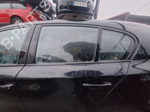 Elevalunas trasero izquierdo BMW 1 (E87) 118 d (143 hp) 31073877