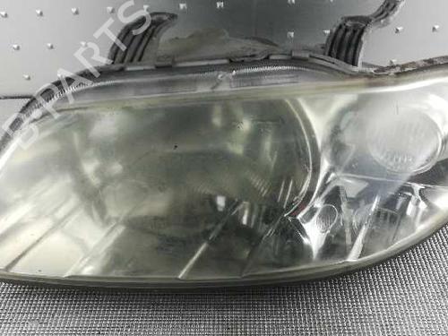 Used Left headlight CHEVROLET AVEO / KALOS Hatchback (T200) 1.4 16V (94 hp) 3123717