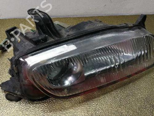 Used Left headlight MAZDA 323 F V (BA) 1.5 16V (BA11) (88 hp) 1386937