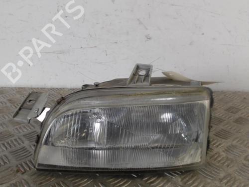 Used Left headlight FIAT PUNTO (176_) 1.7 TD (69 hp) 30016865