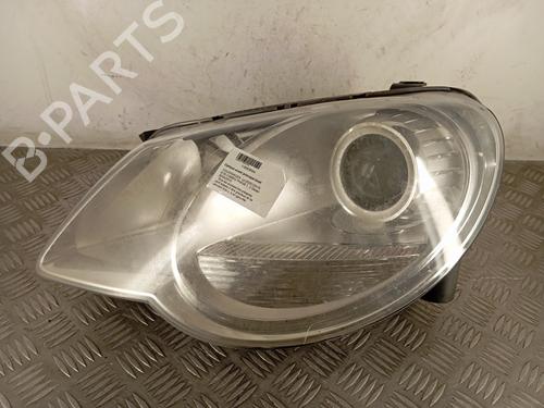 Used Right headlight VW EOS (1F7, 1F8) 2.0 TDI 16V (140 hp) 31064308