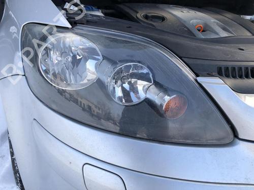 Used Right headlight VW GOLF PLUS V (5M1, 521) 1.6 FSI (115 hp) 31959590